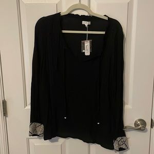 Black peasant top with embroidered cuffs